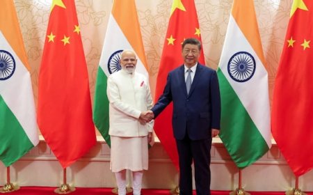 China's Xi and India's Modi vow to resolve border differences at summit