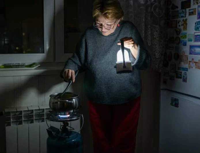 Kyiv residents stranded in tower blocks as Russia targets power system