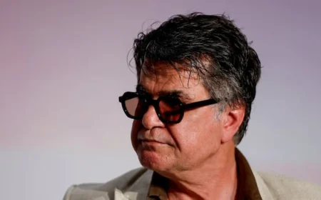 Oscar-nominated director Jafar Panahi says he will return to Iran despite looming arrest