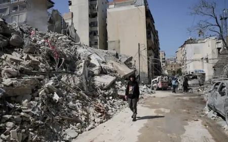 Israeli airstrikes in Beirut intensify, demolishing a 10-storey building and striking bridges