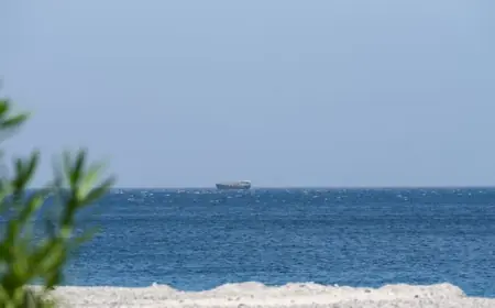 Strikes continue across Gulf countries amid confusion over status of Strait of Hormuz