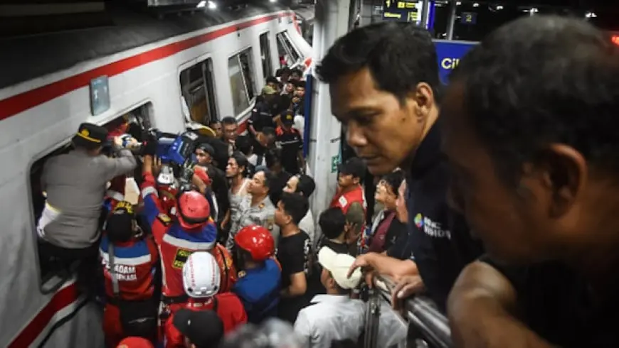 Train collision in Indonesia kills 14, injures dozens as rescuers recover last victims