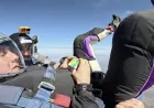 Think solving a Rubik's Cube is hard? Try doing it while freefalling from a plane