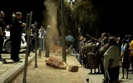 Protesters clash with police in Australia after suspected killer of Indigenous girl arrested
