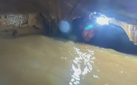 Rescuers in Laos race to reach villagers trapped in flooded cave