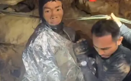 Rescuers free 4 men trapped in flooded cave in Laos, search for 2 still missing