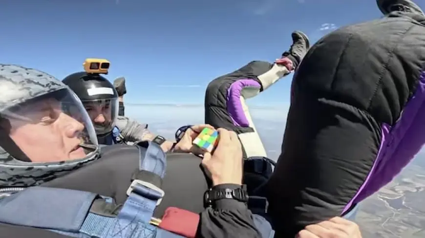 Think solving a Rubik's Cube is hard? Try doing it while freefalling from a plane