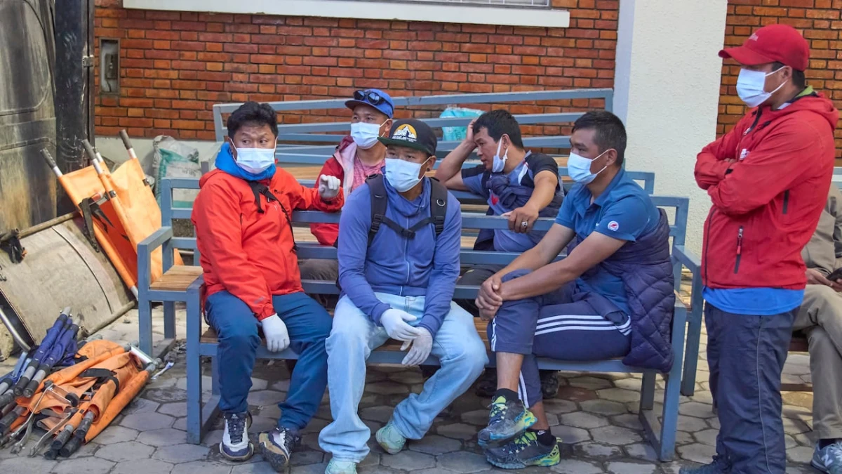 Rescue teams search Nepal mountain for 12 swept away by avalanche
